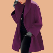 Elegant oversize women's winter coat with a wide collar 2