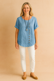 Liva | Asymmetrical blouse with decorative clasp 5