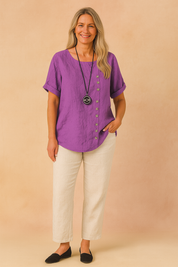 Liva | Asymmetrical blouse with decorative clasp 7