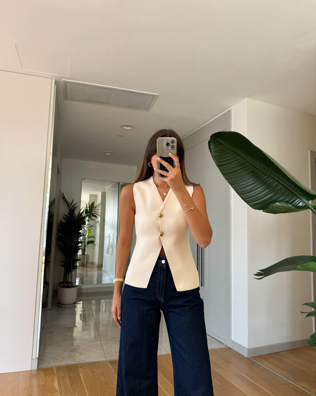 Women's Vest with Button Front, V-Neck, and Asymmetric Hem for Casual and Professional Style 1