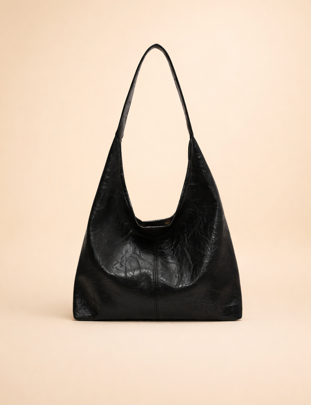 black-leather-hobo-bag-elegant-shoulder-carry-fashion-studio-shot.png