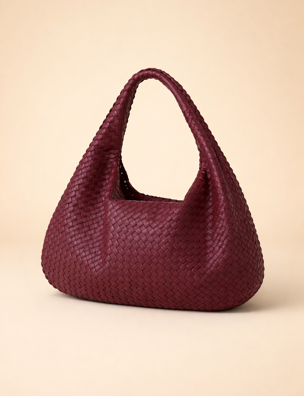 burgundy-woven-leather-hobo-bag-studio-model-style-fashion-shot.png