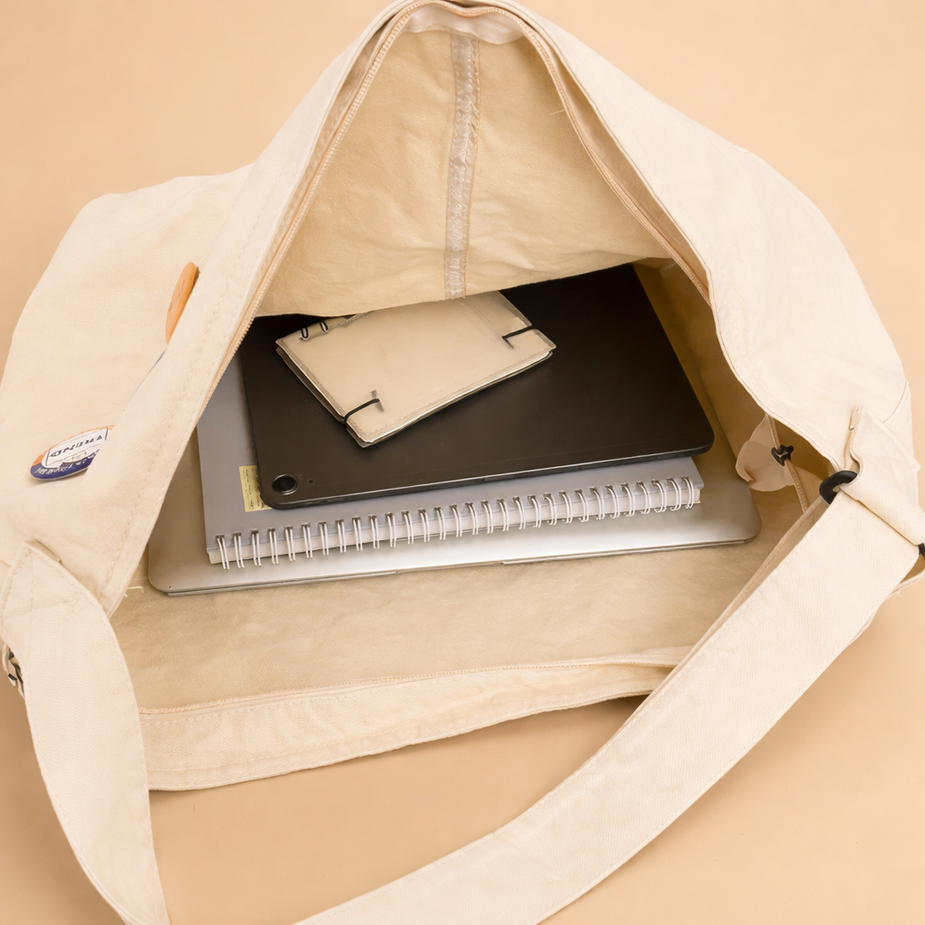 elegant-european-studio-model-tote-bag-canvas-neutral-sand-editorial-product-shot.png