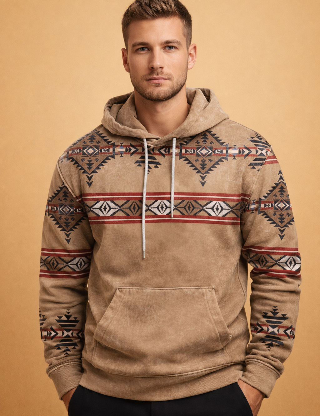 polish-male-model-wearing-beige-aztec-pattern-hoodie-studio-posed-upper-bod.png