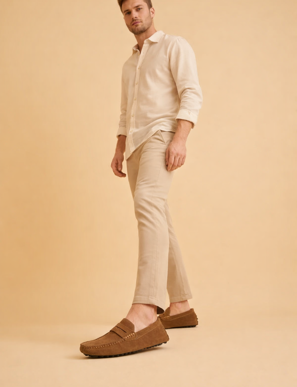 polish-male-model-wearing-brown-suede-penny-loafers-european-studio-pose.png
