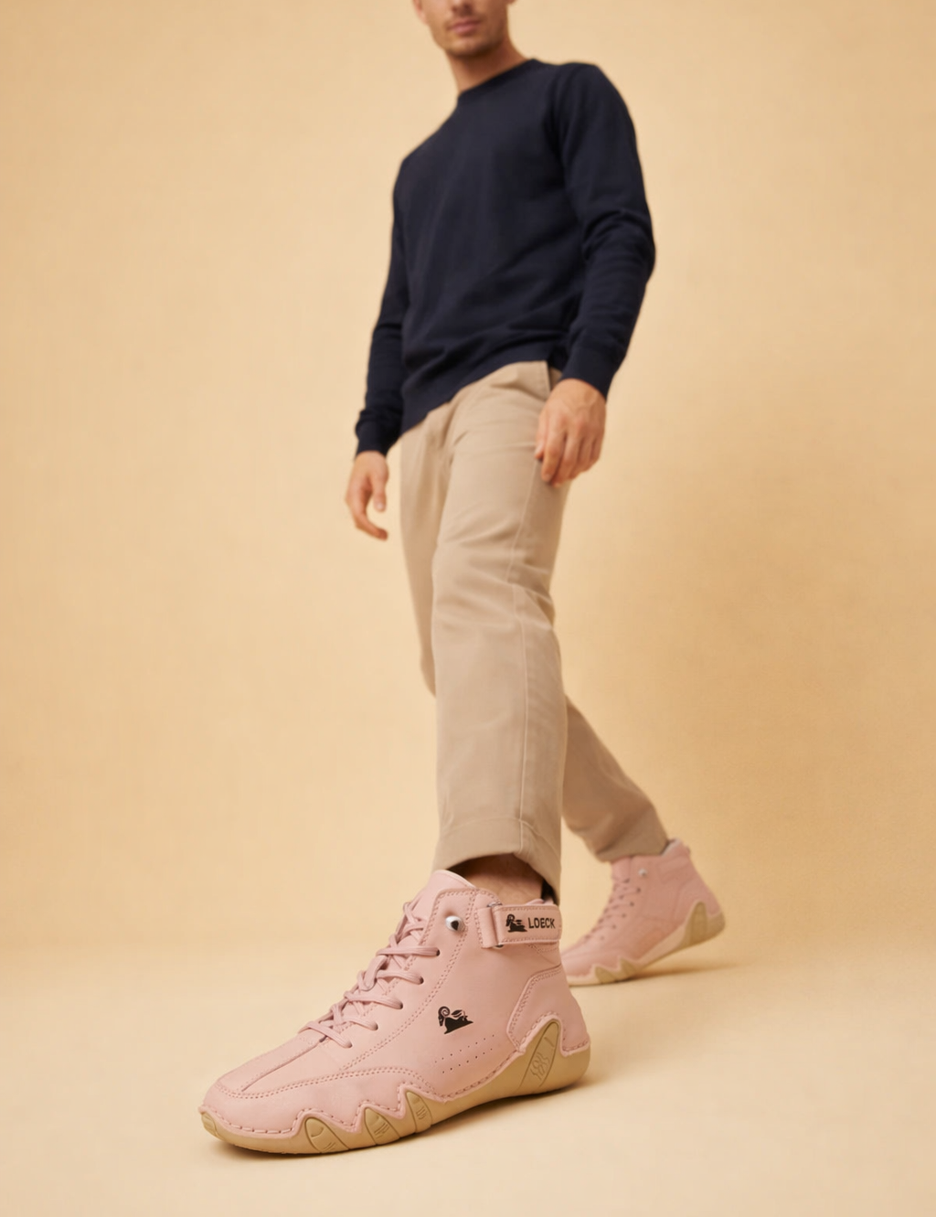 polish-male-model-wearing-pink-high-top-sneakers-european-studio-posed-shot.png