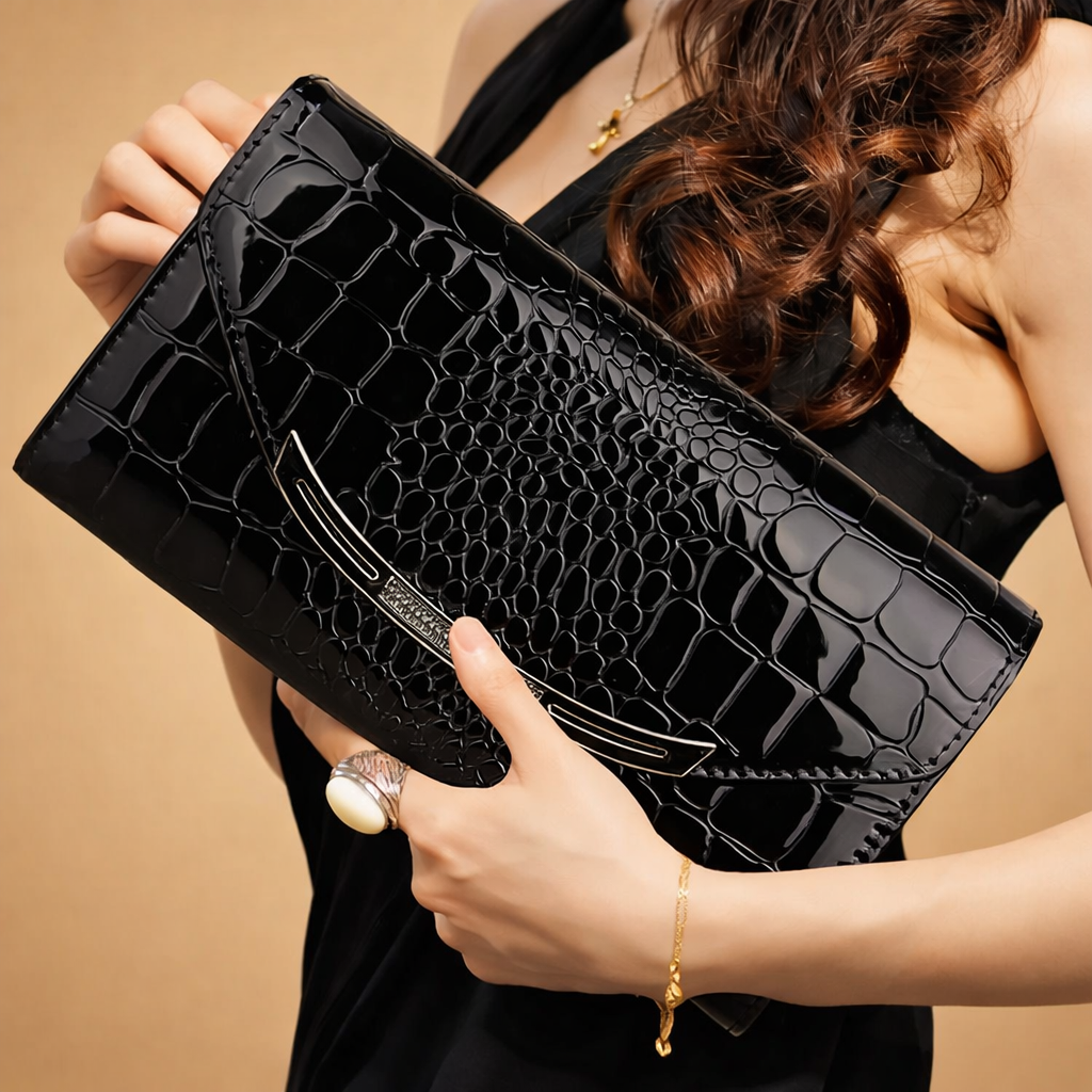 polish-model-holding-black-crocodile-embossed-clutch-studio-fashion-pose.png