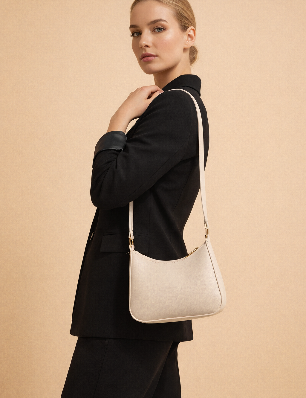 polish-model-wearing-minimalist-cream-shoulder-bag-studio-fashion-pose.png