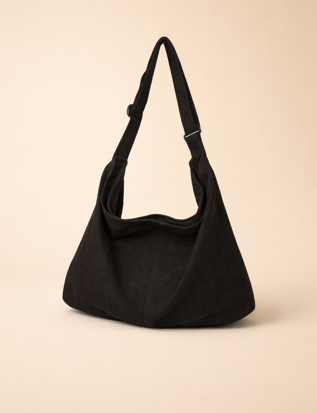 posed-studio-model-style-black-hobo-shoulder-bag-european-fashion-editorial-product-shot.png