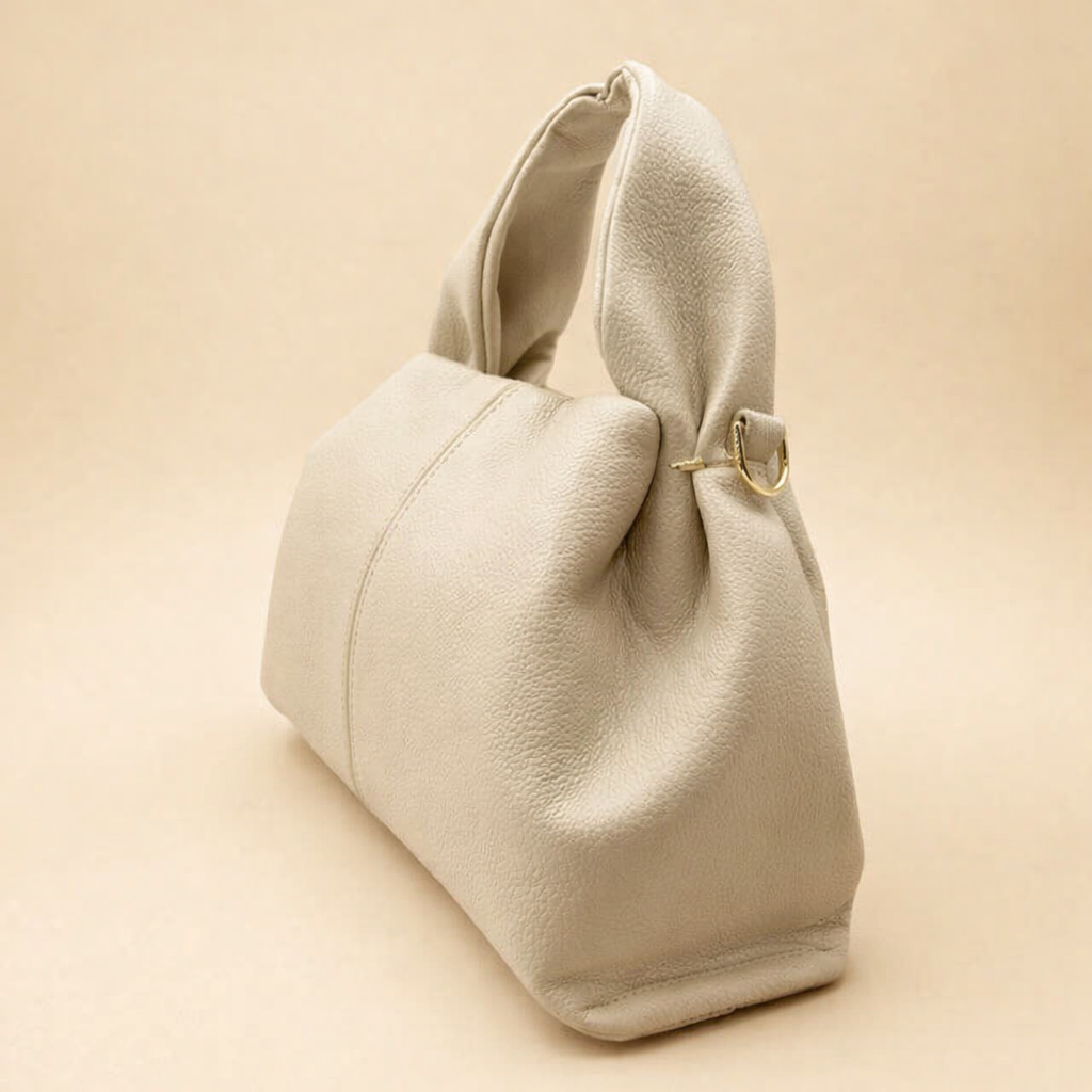 taupe-pebbled-leather-hobo-bag-elegant-studio-fashion-pose_2.png