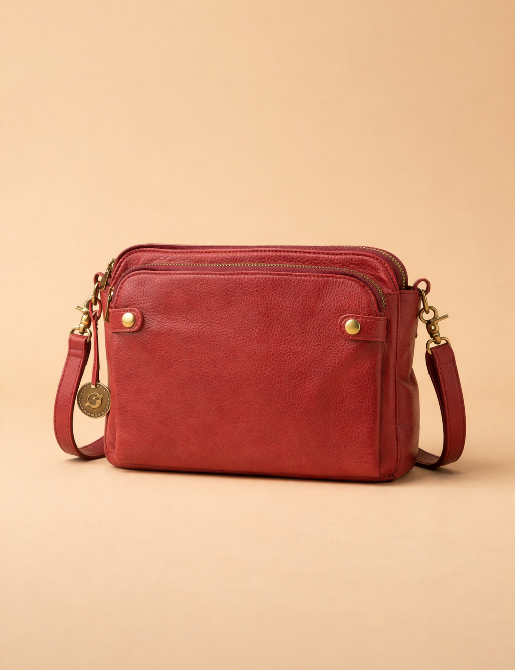 vintage-red-leather-crossbody-bag-front-studio-pose-european-fashion-catalog.png